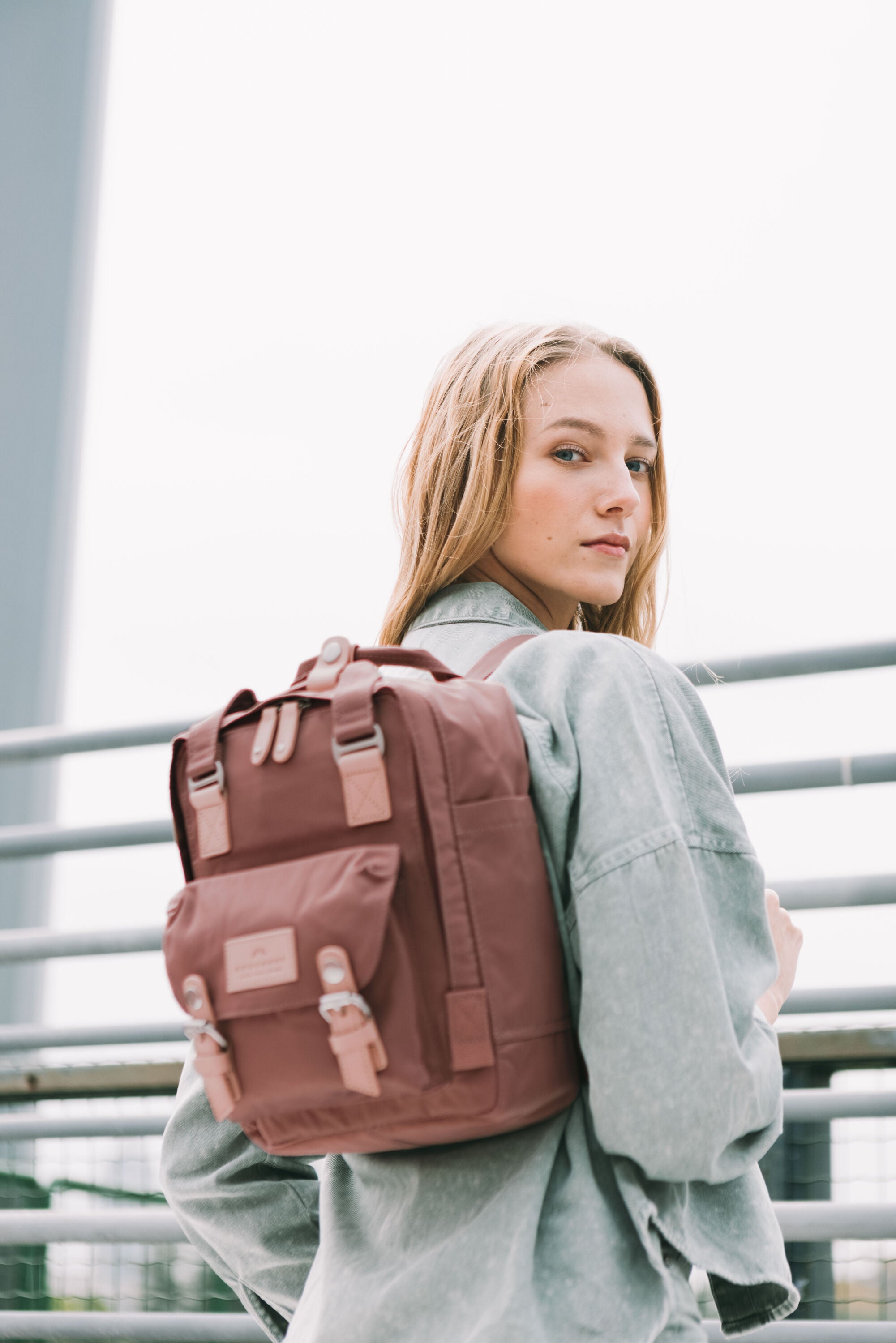 doughnut women's mini macaroon backpack Pastel Series Stone A Portal to a Pure White Soundscape Tucked away at a busy city corner Macaroon Mini Doughnut Backpack